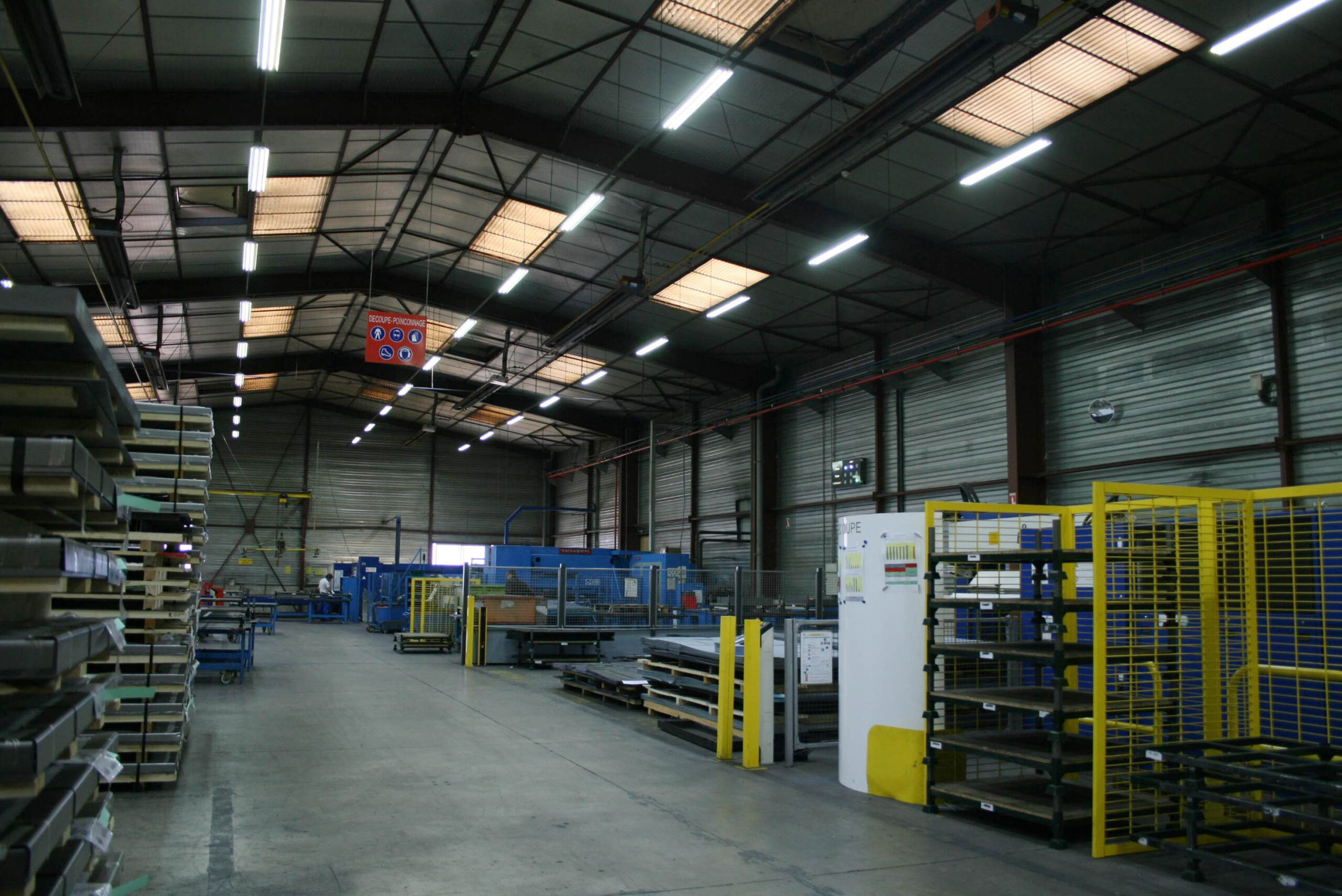Industrial production area with ceiling-mounted linear LED lighting