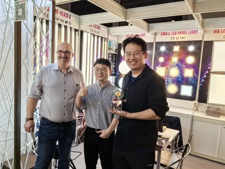Visitors with the New Lights team at Hong Kong Lighting Fair Spring 2024