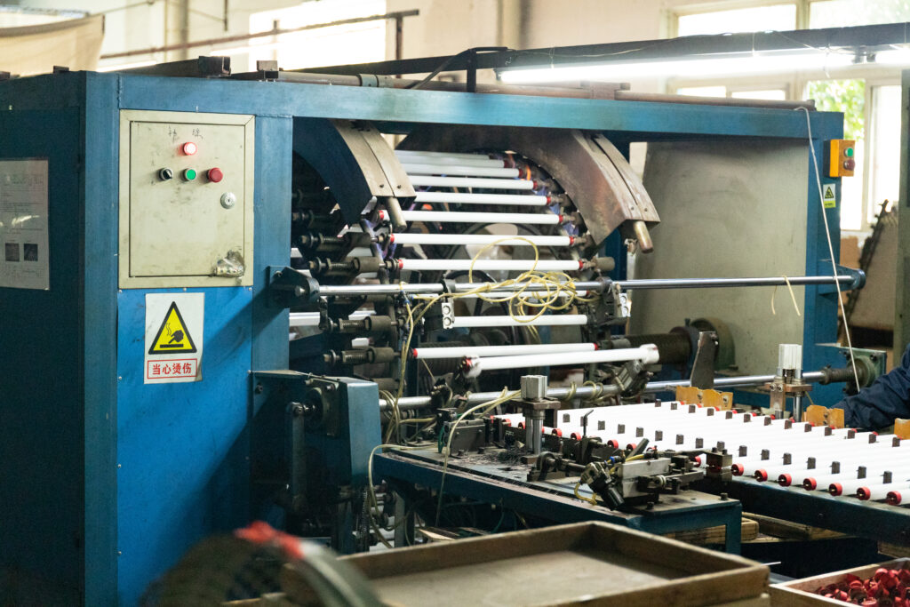 LED tube end cap assembly process at the New Lights factory