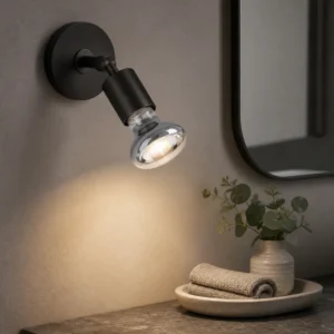 R series LED filament reflector bulb installed base-first in an adjustable indoor wall spotlight
