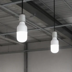 T Series LED SMD bulbs installed in exposed industrial pendant holders
