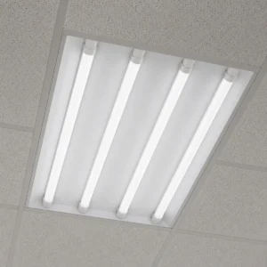 Four Type A T8 LED tubes seated in G13 lampholders inside a recessed office troffer