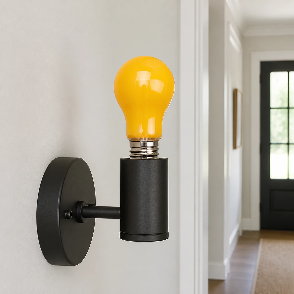 Unlit yellow-amber opal A60 LED filament bulb seated upright in an indoor wall fixture
