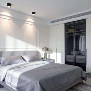 ITFT01M family adjustable surface-mounted LED downlights illuminating a bedroom wall