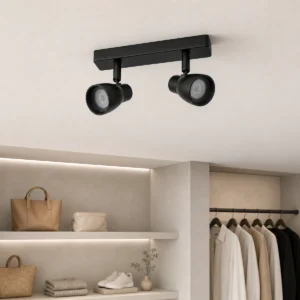 Black dual-head CSL-0RB2H integrated LED spotlight surface-mounted on a retail ceiling