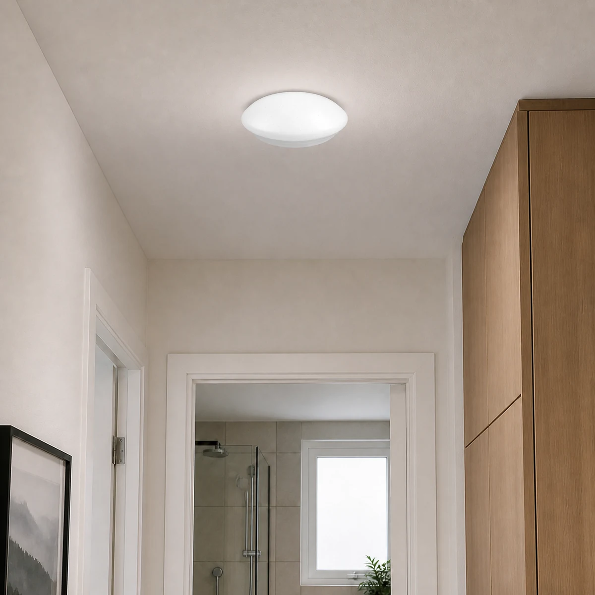Round IP54 flush-mount LED ceiling lamp installed in an indoor corridor