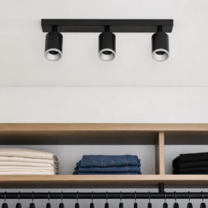 linear multi-head gu10/mr16 spotlight housings installed in a dry indoor display area