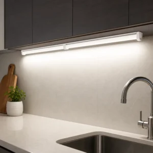 Rotatable LED linear fixtures surface-mounted under kitchen cabinets with neutral white task light