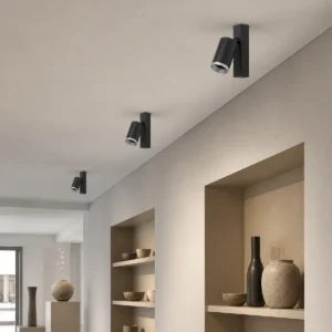 single-head surface-mounted gu10/mr16 spotlight housings installed in a dry indoor display area