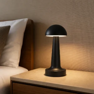 Slim dome cordless LED table lamp on a side table