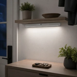 TQT013 rechargeable magnetic sensor light bar installed beneath a kitchen cabinet