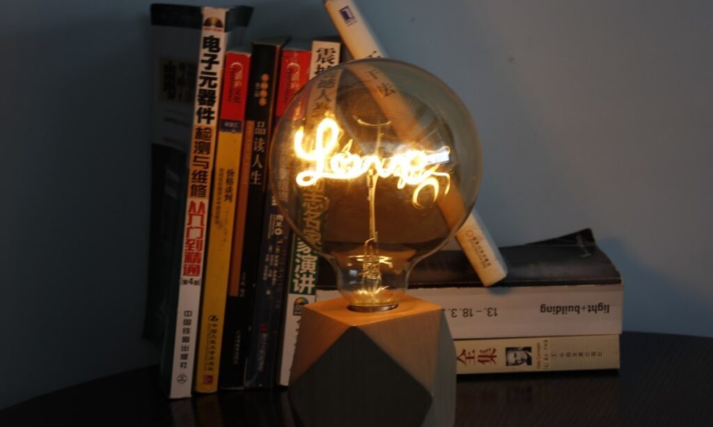 Decorative word filament bulb for product specification planning