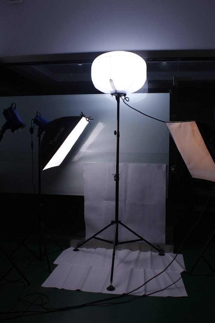 New Lights LED balloon work light illuminated on an adjustable tripod during an indoor setup