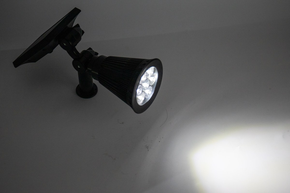 Illuminated New Lights solar landscape spotlight aimed at a defined surface