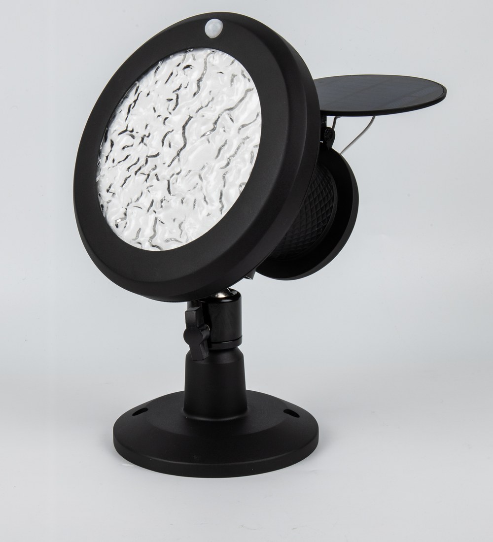 New Lights solar wall and landscape light sample with sensor, panel, optic, pivot and base visible